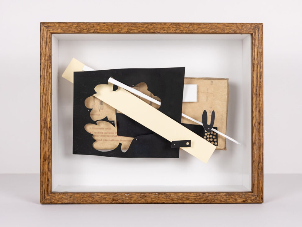 How to Build a Bunny, 3D paper assemblage by Laura Kinney with cut paper, found materials, and mixed elements in a wood shadow box