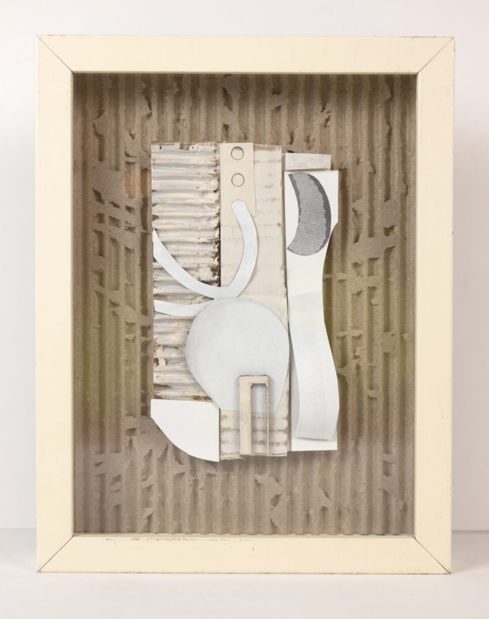 Inheritance, 3D paper assemblage by Laura Kinney with corrugated cardboard, cut mat board, and mixed paper elements in a cream frame